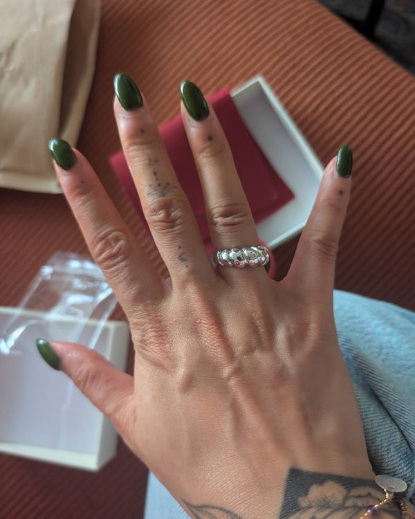 Hand-carved ring cast in sterling silver after a Nūrain jewellery making workshop